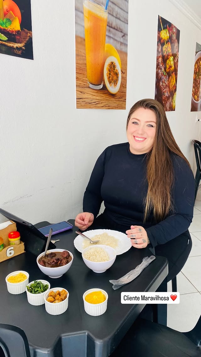 Cliente curtindo a feijoada